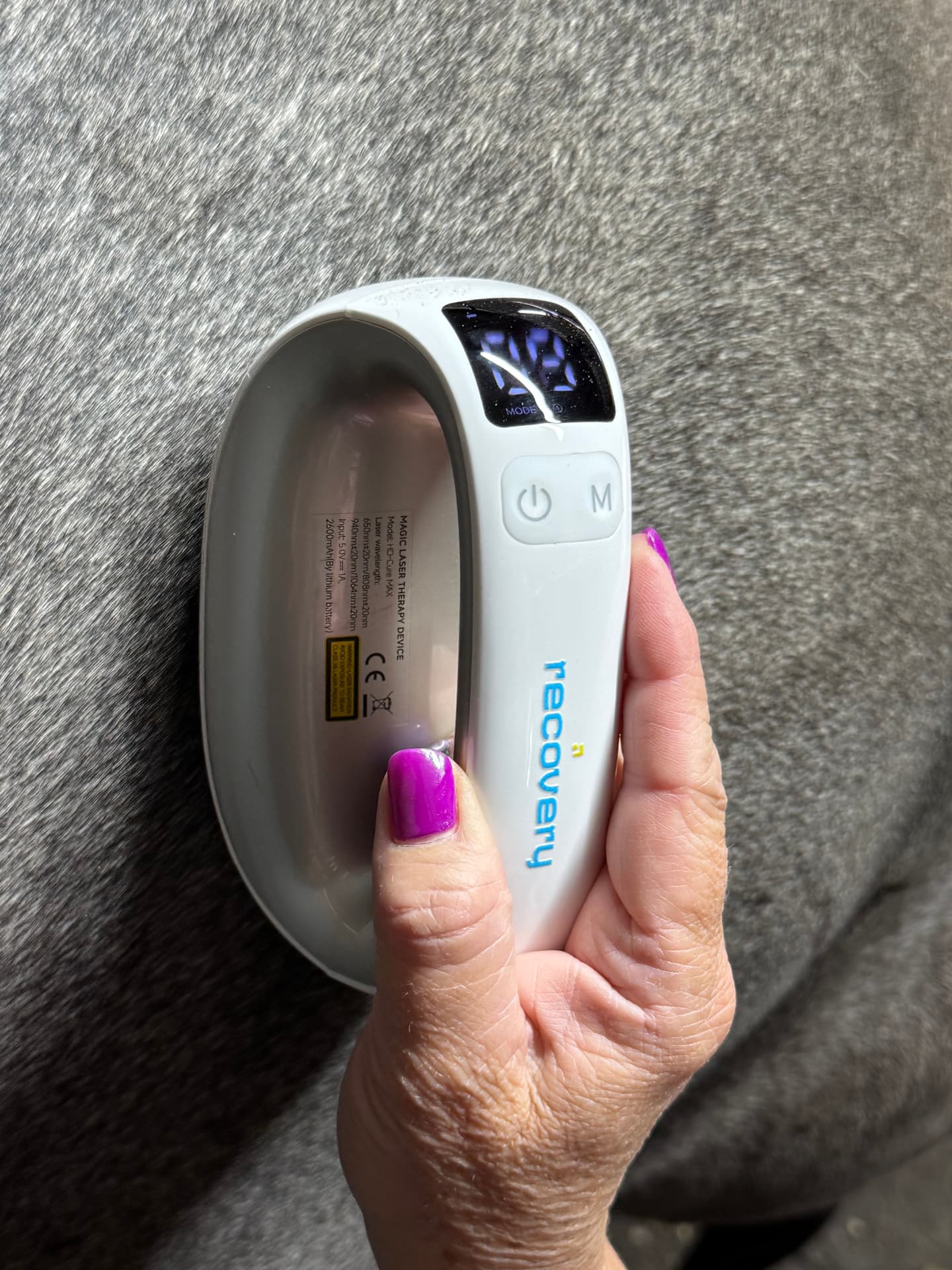 Close-up of Questrian Recovery’s display and two-button controls
